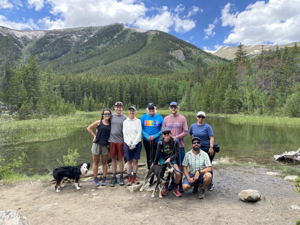 Hikers in front of a lake for Pride On The Divide Leadville