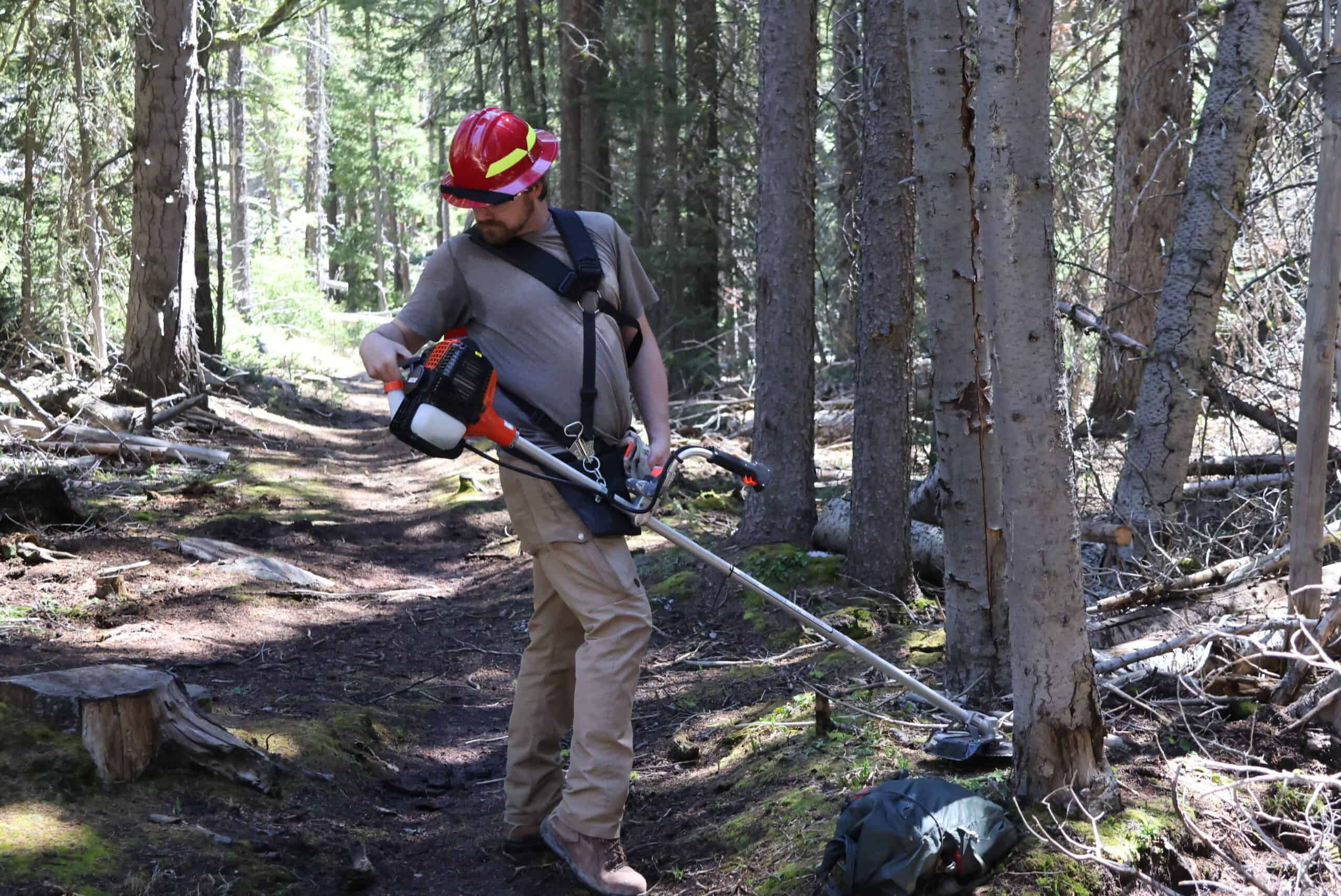 Volunteer performing trail maintenance. 5i0a2115