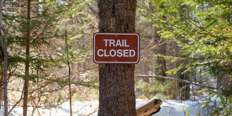 Trail closure warning sign on the Continental Divide Trail