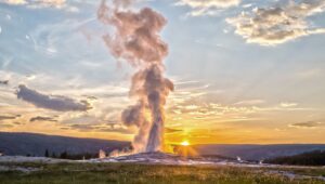 Old Faithful geyser erupting in Yellowstone National Park